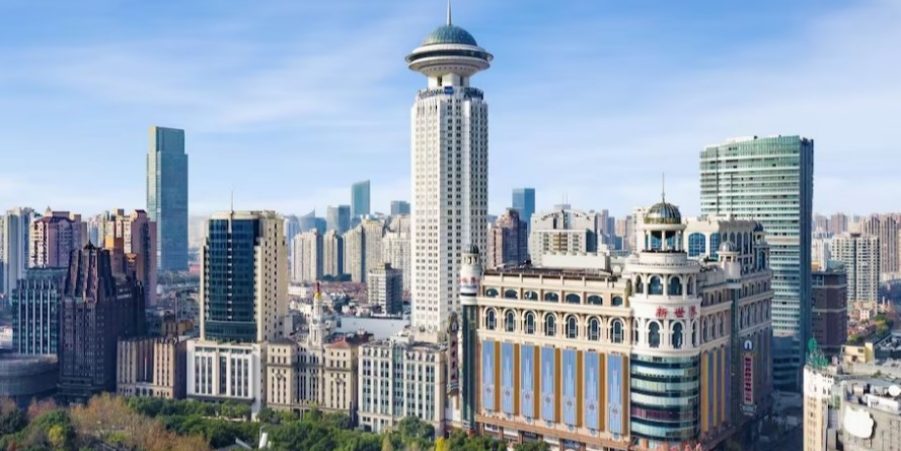 A panoramic view of Shanghai's skyline, showcasing towering skyscrapers.